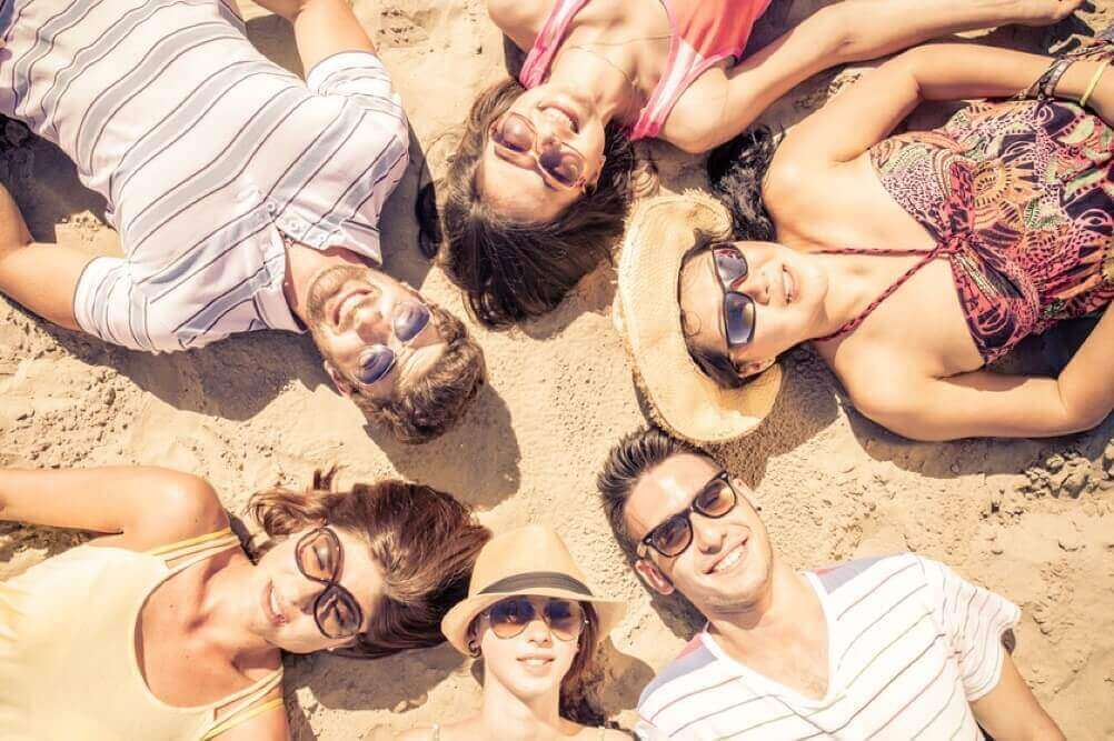 Lotto Tips on how to win Group of friends lying on the beach
