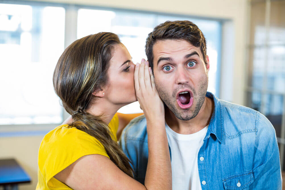 Woman telling a man she has won the lottery