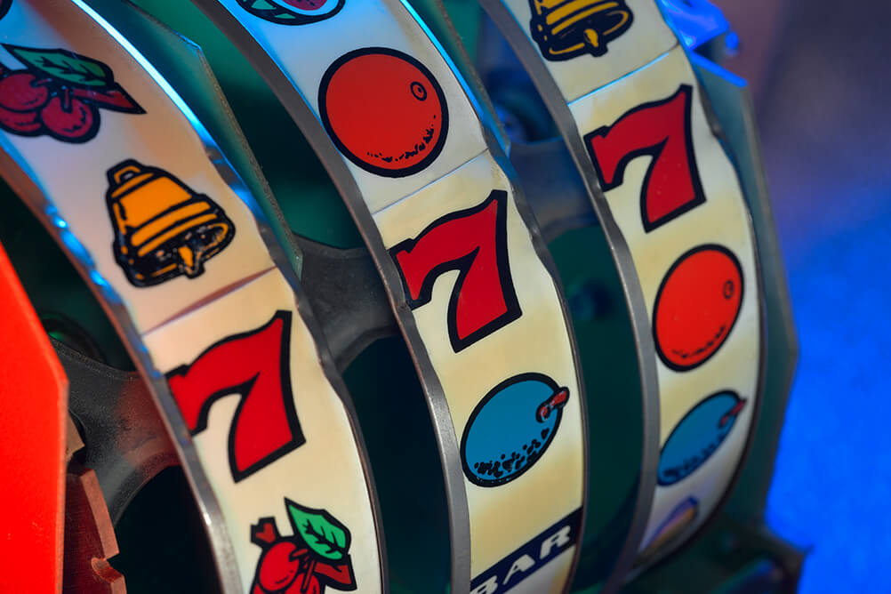 First Slot Machine An image of the reels on and slot machine, inspired by the first slot machine - the liberty bell